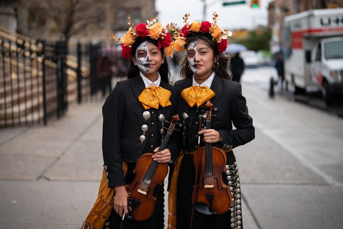 People take part in a Day of the Dead Parade in the Sunset Park neighborhood of Brooklyn in New York on October 29, 2023.